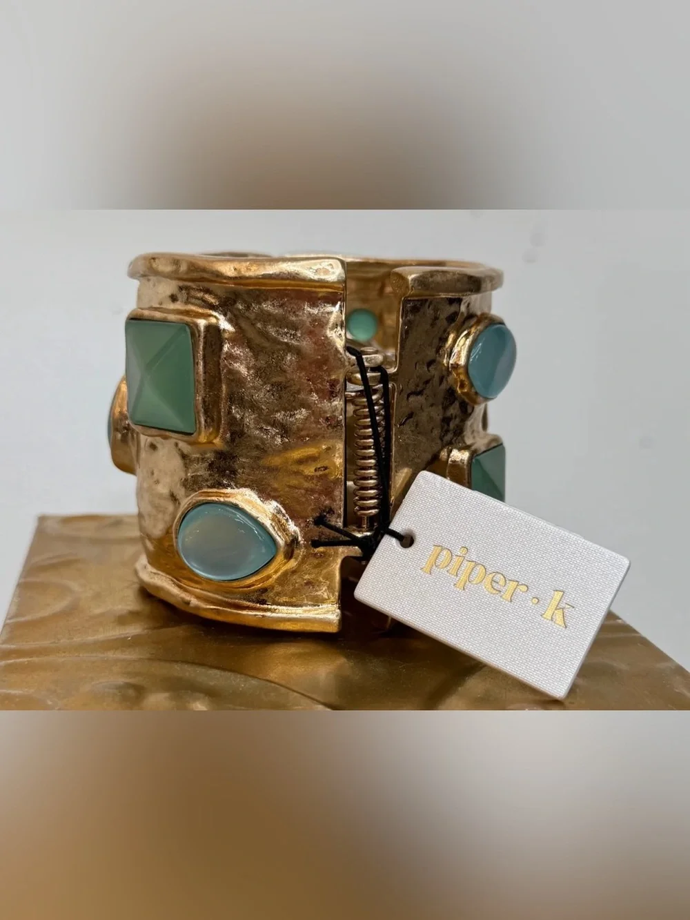 Piper K gem embellished wide gold spring cuff
NWOT - Picture 3 of 4